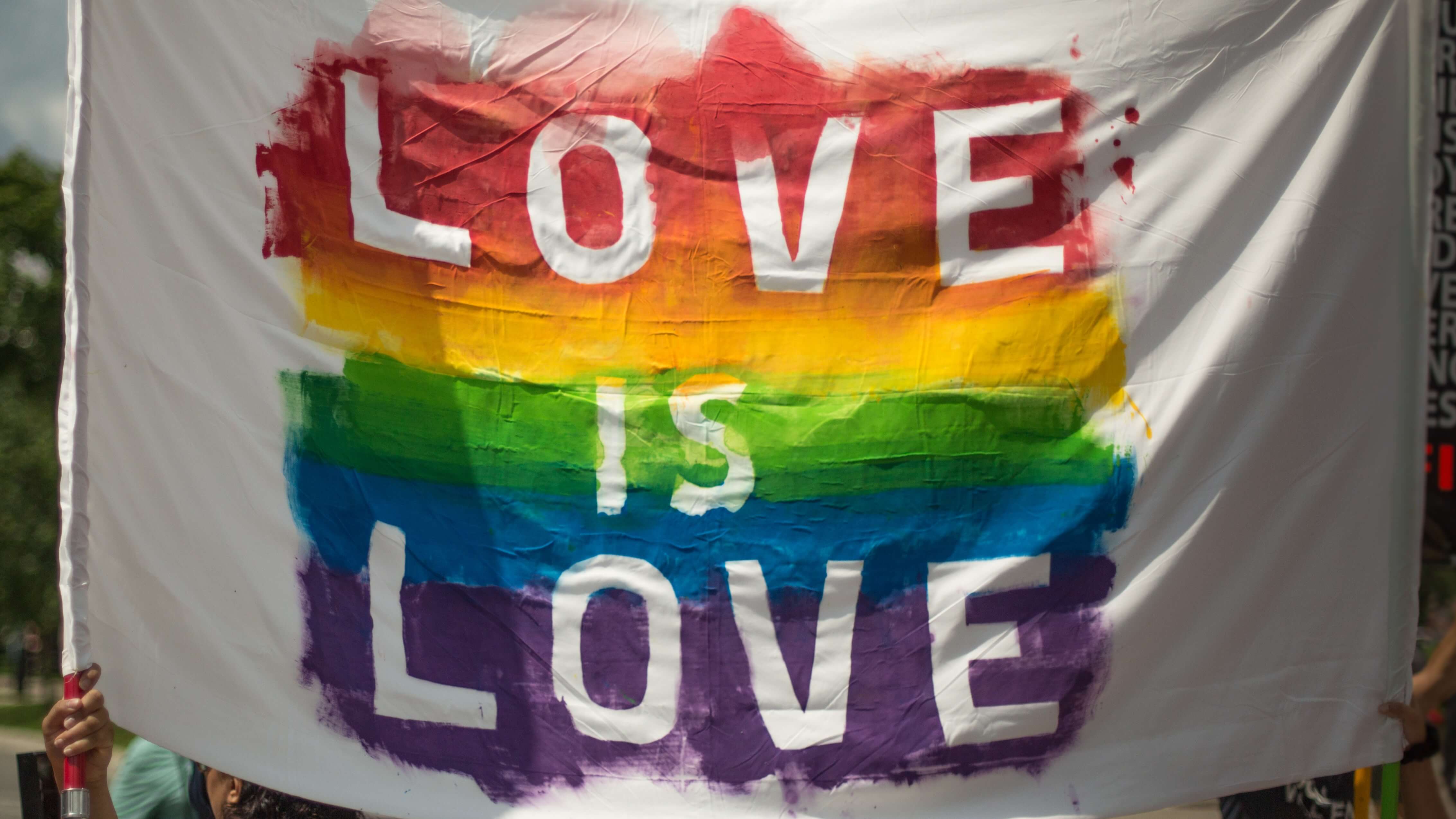 Flag with a text Love is Love
