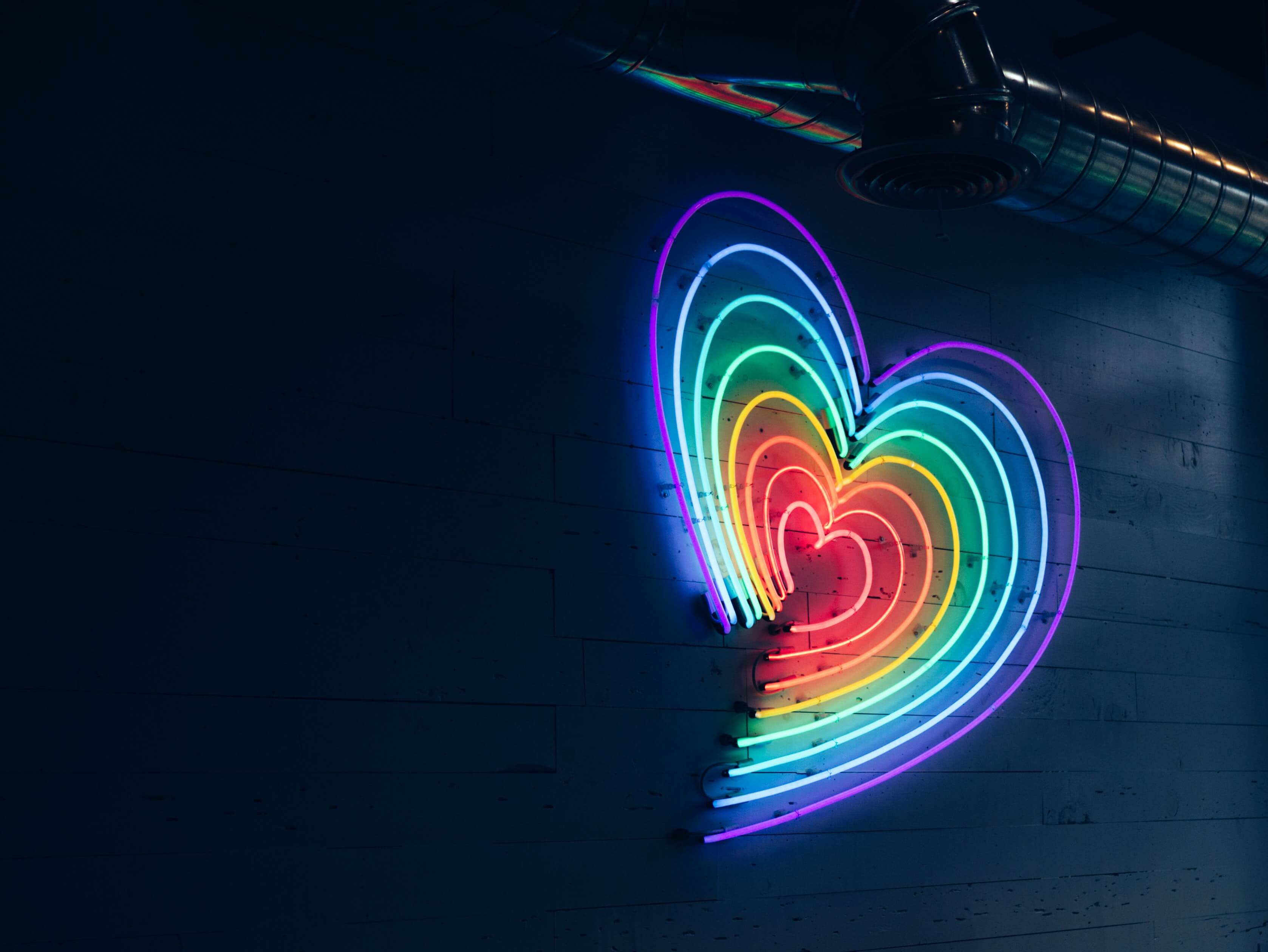 Rainbow colored lamp in a shape of heart